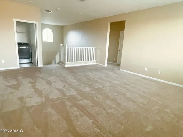 a view of a hallway with closet area