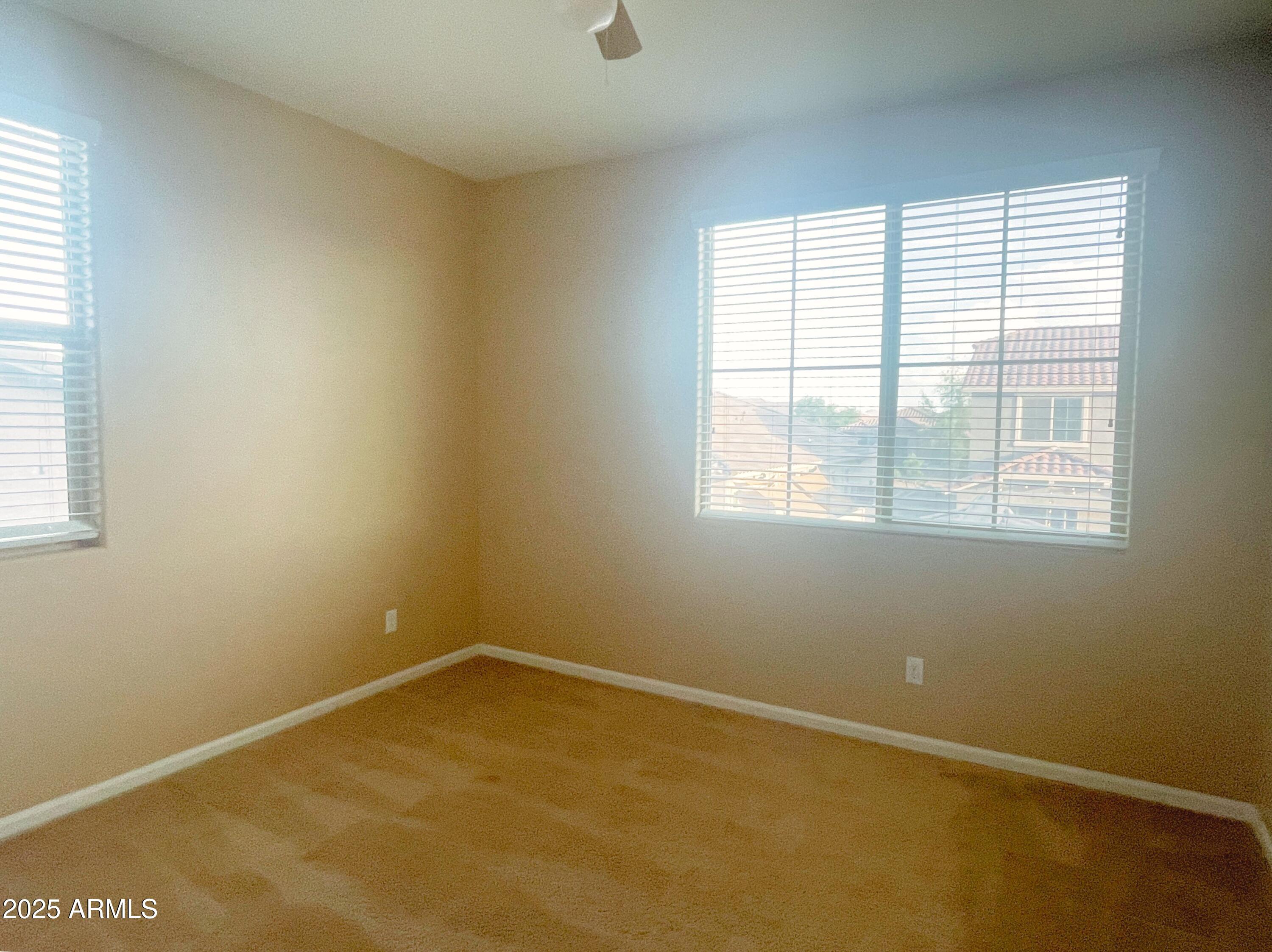 1121 East Regent Drive Gilbert, AZ 85298 - Photo 16 of 23 an empty room with a window