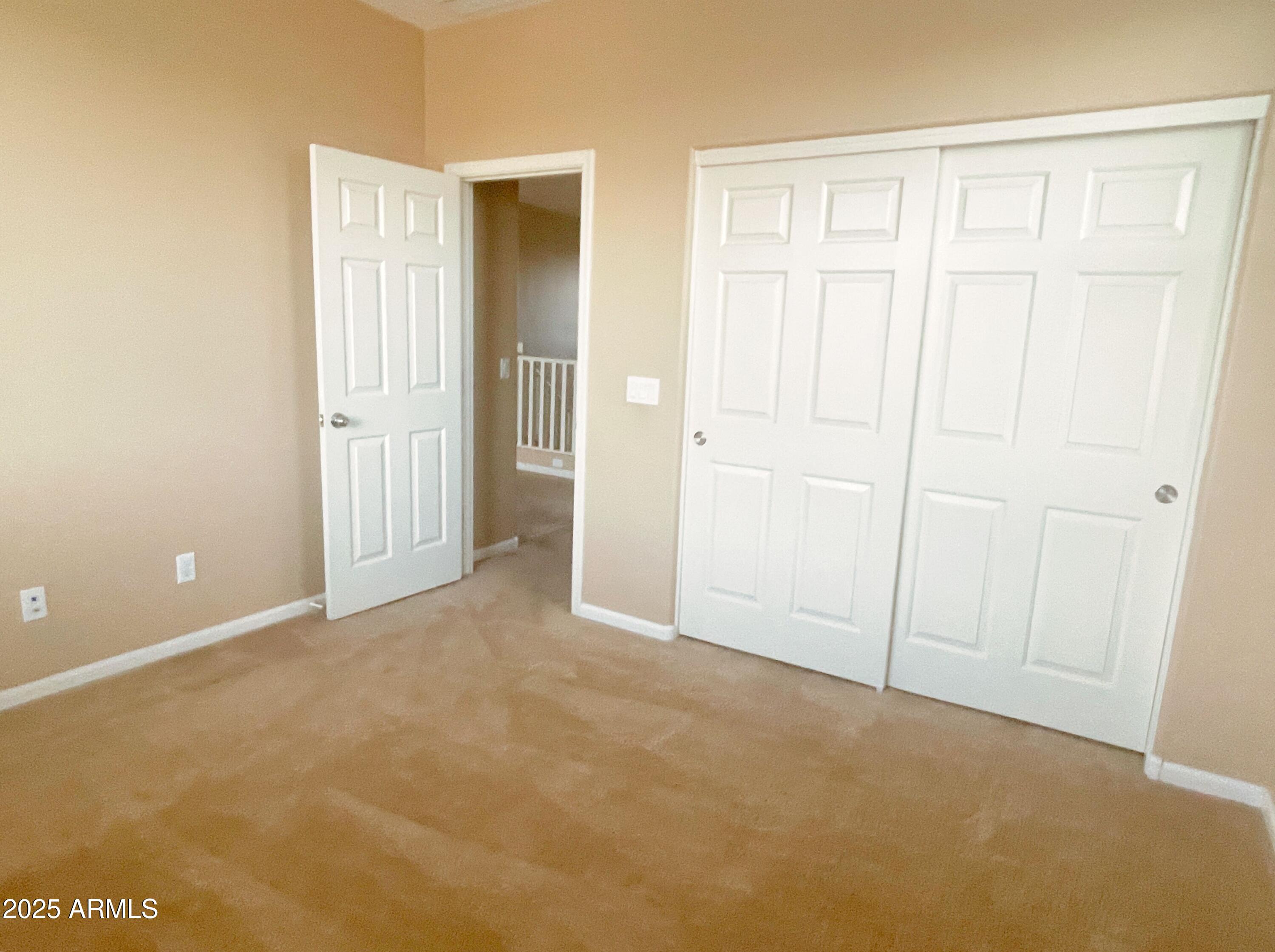 1121 East Regent Drive Gilbert, AZ 85298 - Photo 17 of 23 an empty room with windows