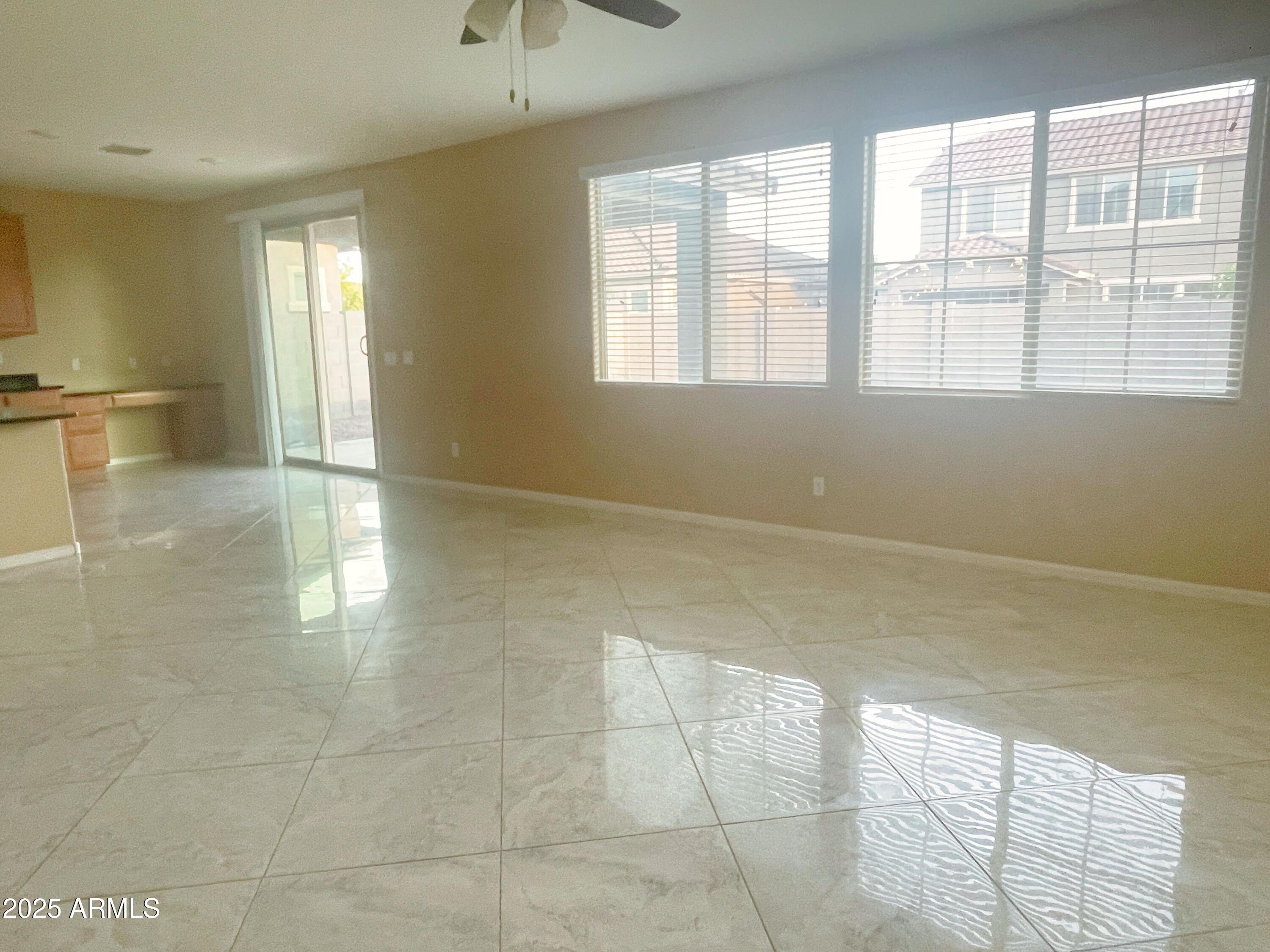 1121 East Regent Drive Gilbert, AZ 85298 - Photo 2 of 23 a view of an empty room with a window
