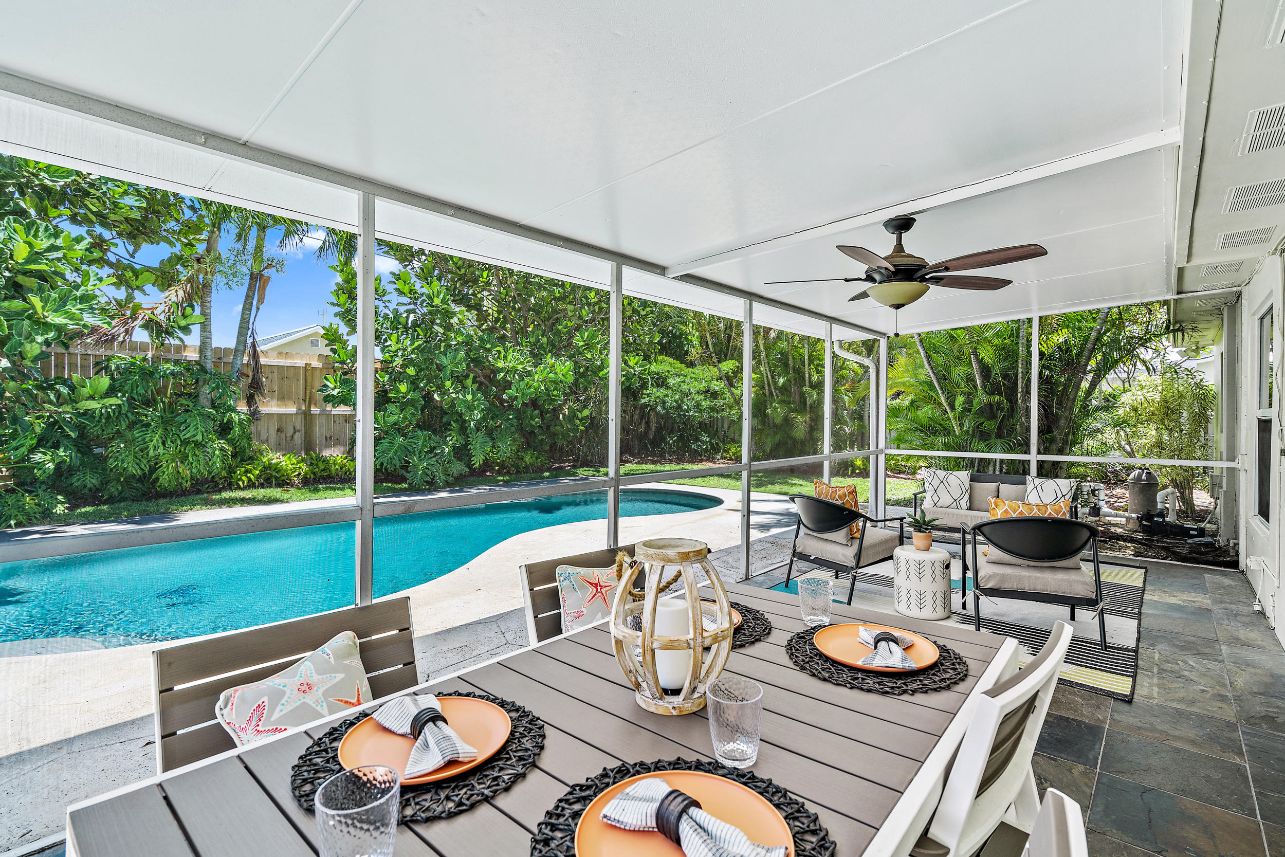 4171 Mark Street Jupiter, FL 33469 - Photo 18 of 26 Screened Patio with Pool View