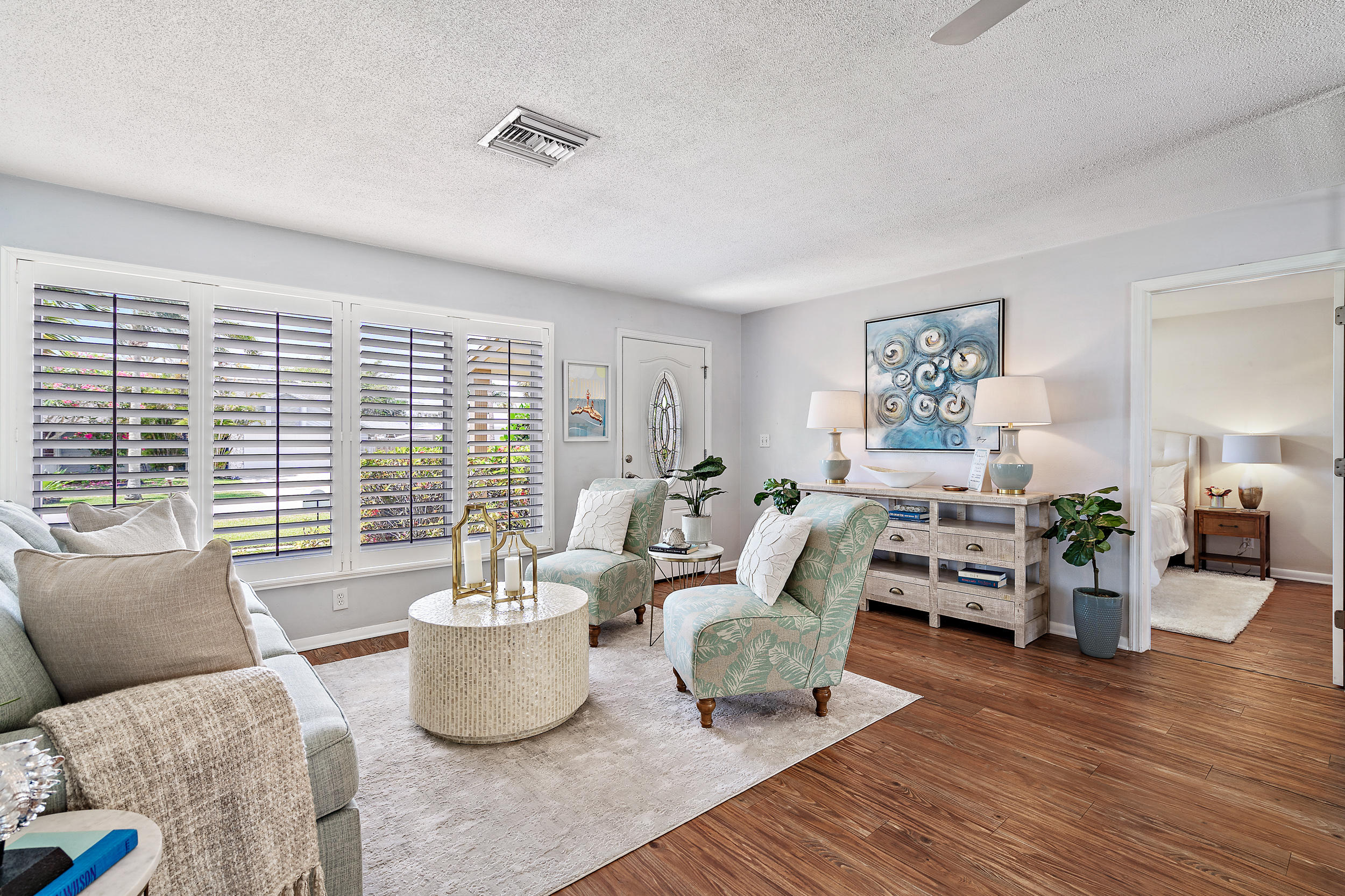 4171 Mark Street Jupiter, FL 33469 - Photo 5 of 26 Sunny Living Area with Pool Views
