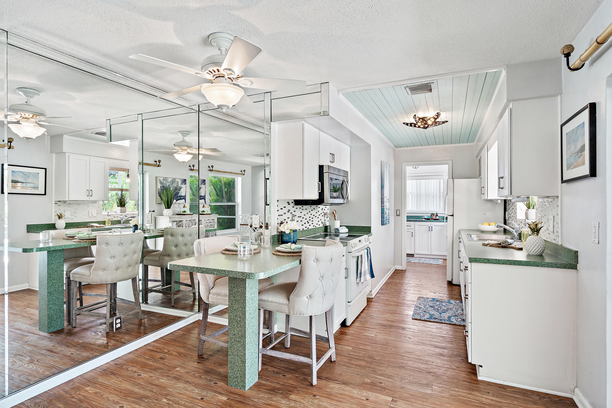4171 Mark Street Jupiter, FL 33469 - Photo 8 of 26 Kitchen with Breakfast Bar