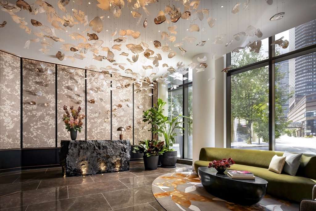 40 Trinity Place, Unit 30D Boston, MA 02116 - Photo 36 of 39 a living room with furniture and a large window