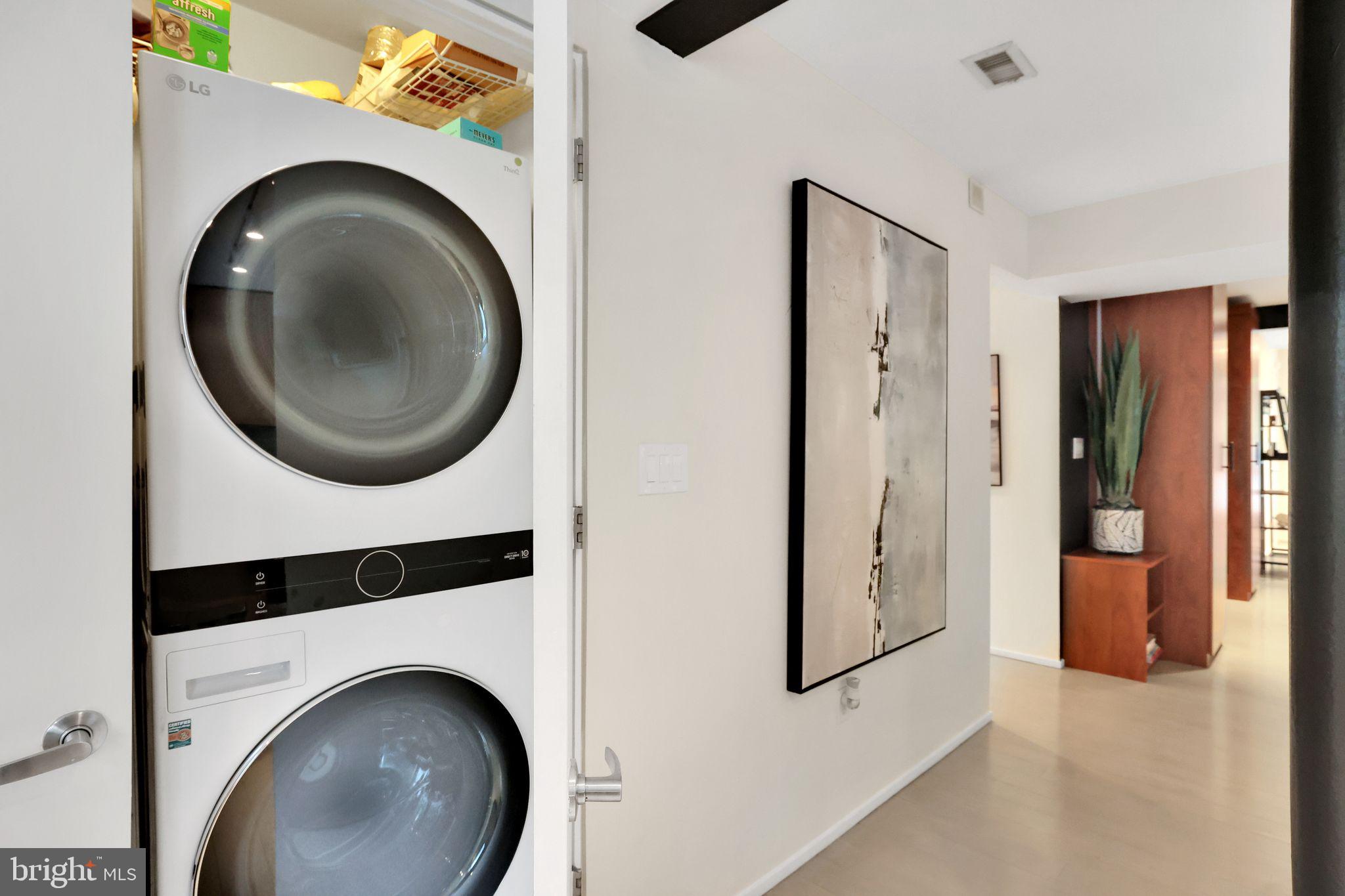 2311 15th Street Northwest, Unit 2 Washington, DC 20009 - Photo 15 of 37 a utility room with dryer and washer