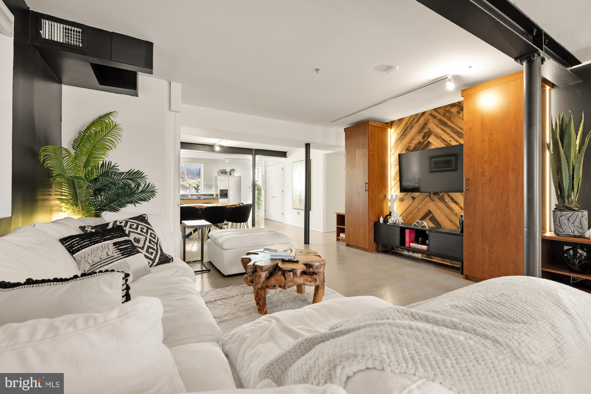 2311 15th Street Northwest, Unit 2 Washington, DC 20009 - Photo 2 of 37 a bedroom with furniture and a large window