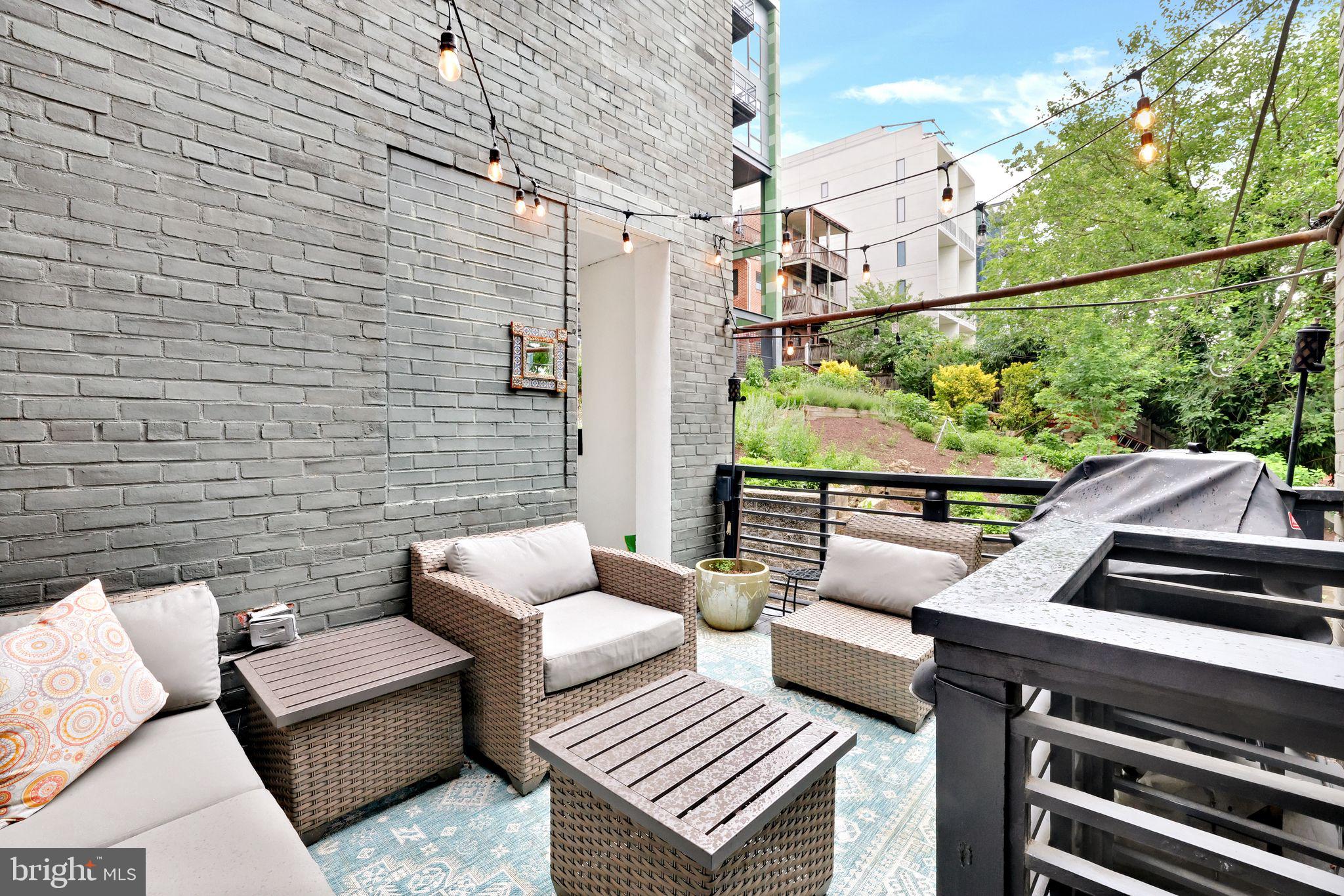 2311 15th Street Northwest, Unit 2 Washington, DC 20009 - Photo 27 of 37 a view of a patio on the roof deck