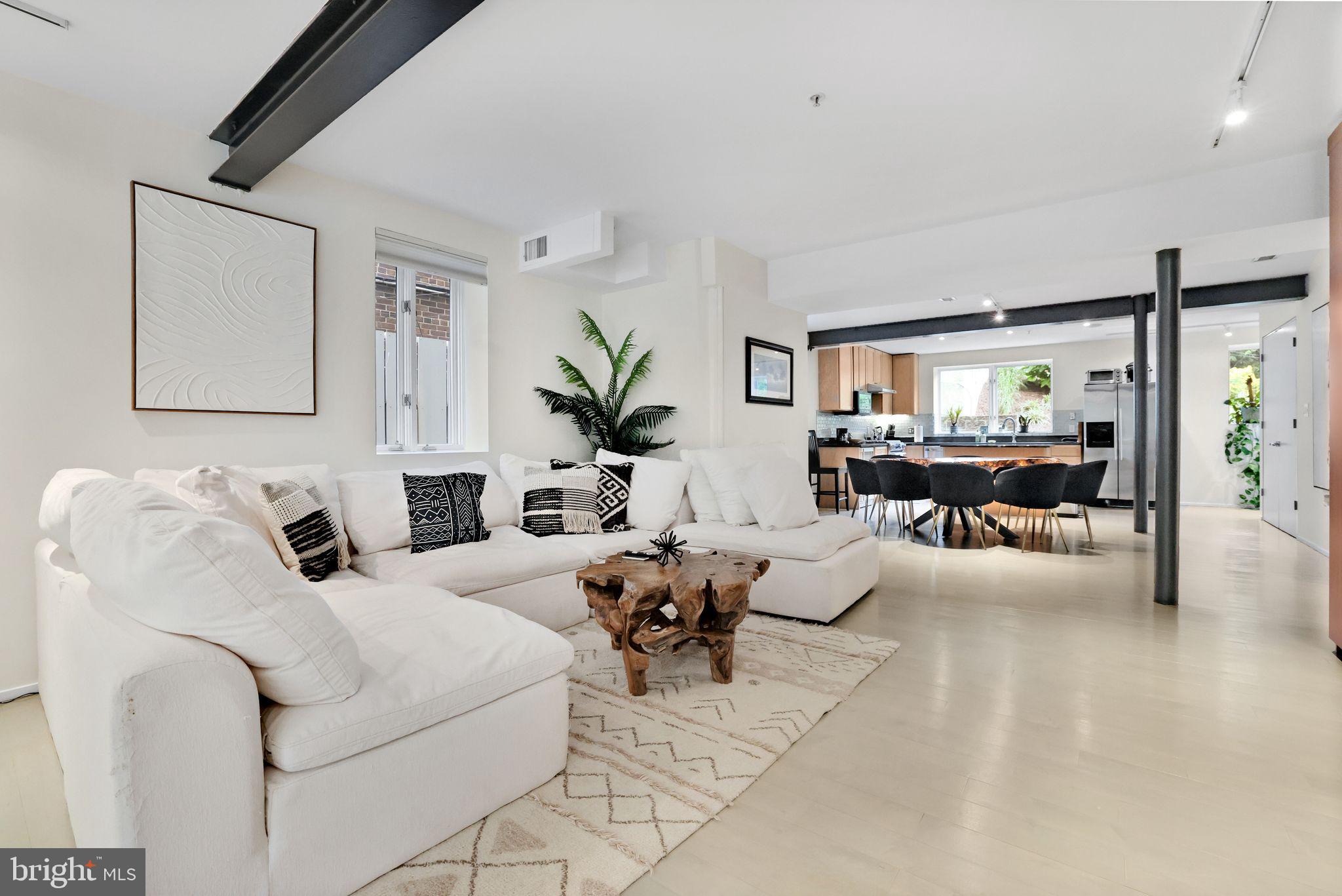 2311 15th Street Northwest, Unit 2 Washington, DC 20009 - Photo 5 of 37 a living room with furniture and view of kitchen