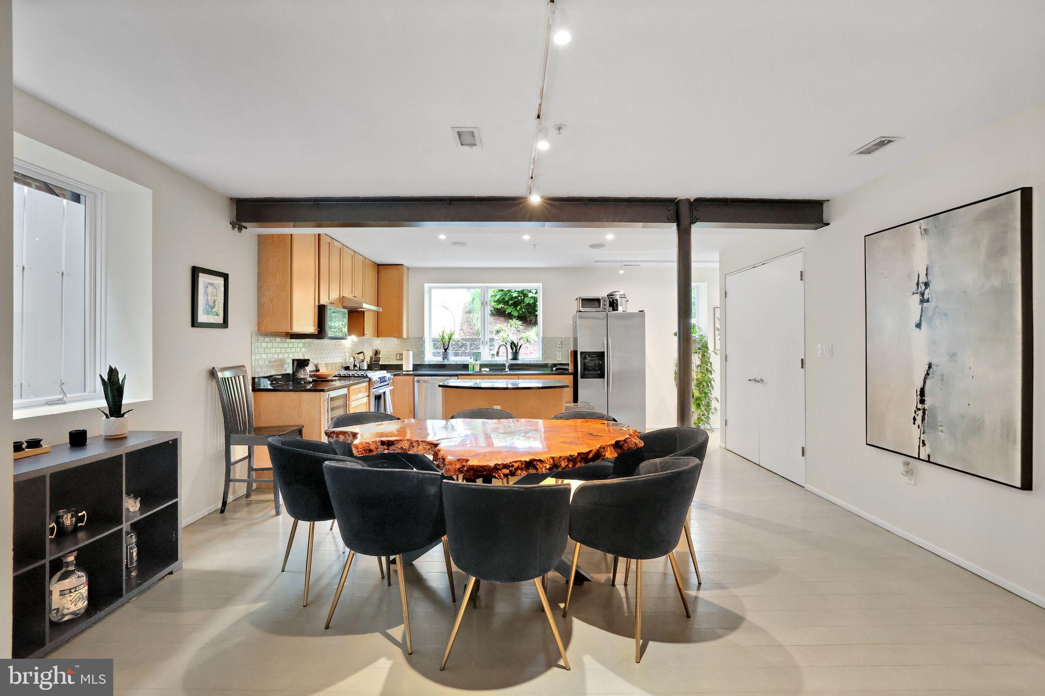 2311 15th Street Northwest, Unit 2 Washington, DC 20009 - Photo 8 of 37 a dining table with chairs and window