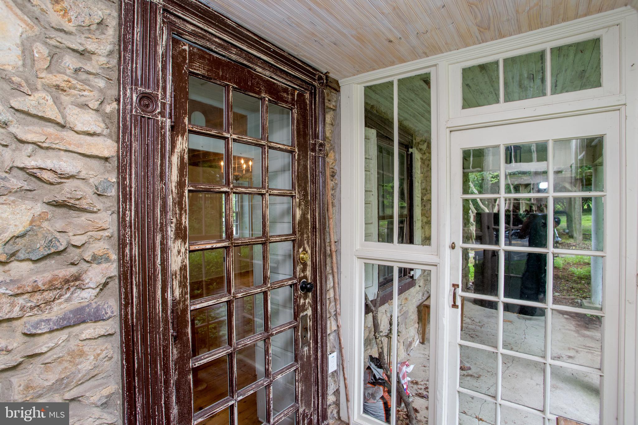 3115 Gallows Hill Road Riegelsville, PA 18077 - Photo 29 of 75 Glass porch on side of house