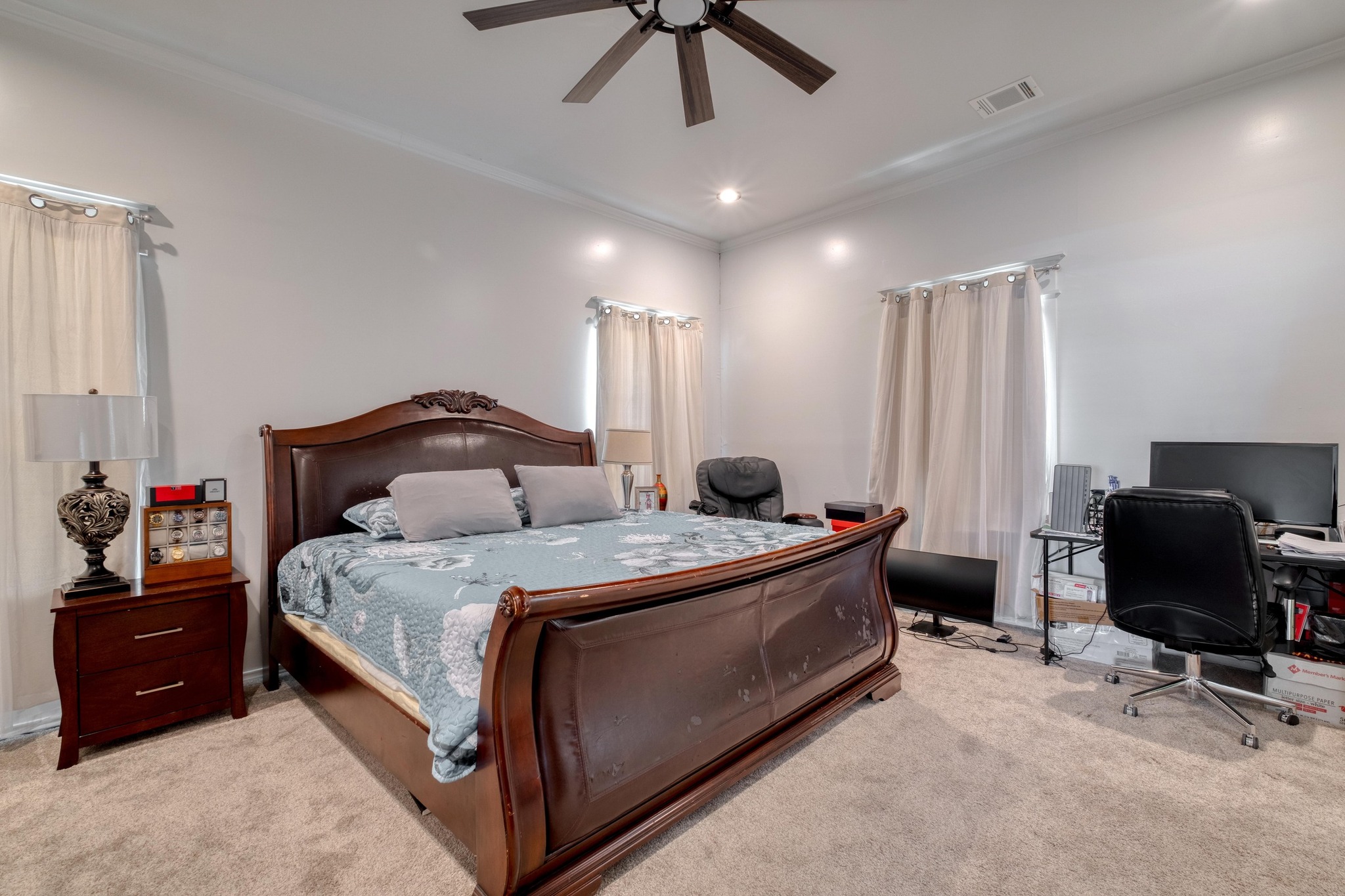 1601 County Road 466 Elgin, TX 78621 - Photo 12 of 39 a bedroom with a bed and a chair