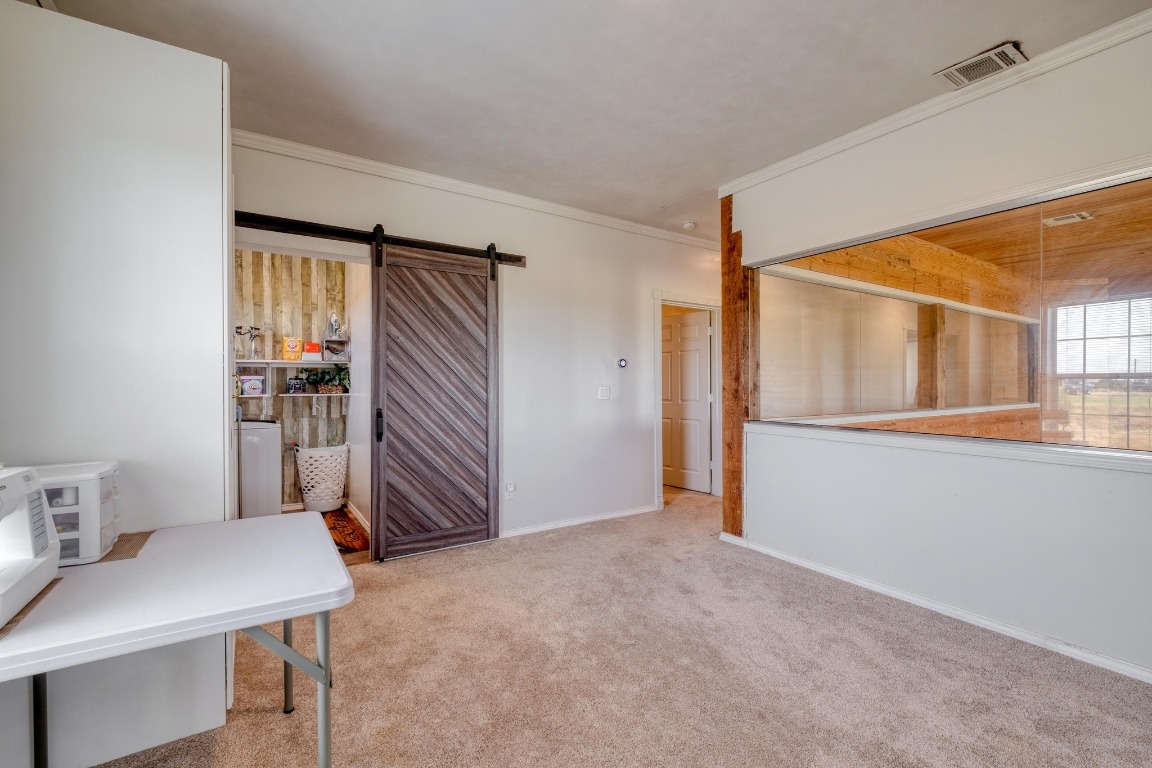 1601 County Road 466 Elgin, TX 78621 - Photo 16 of 39 a view of an empty room with a window