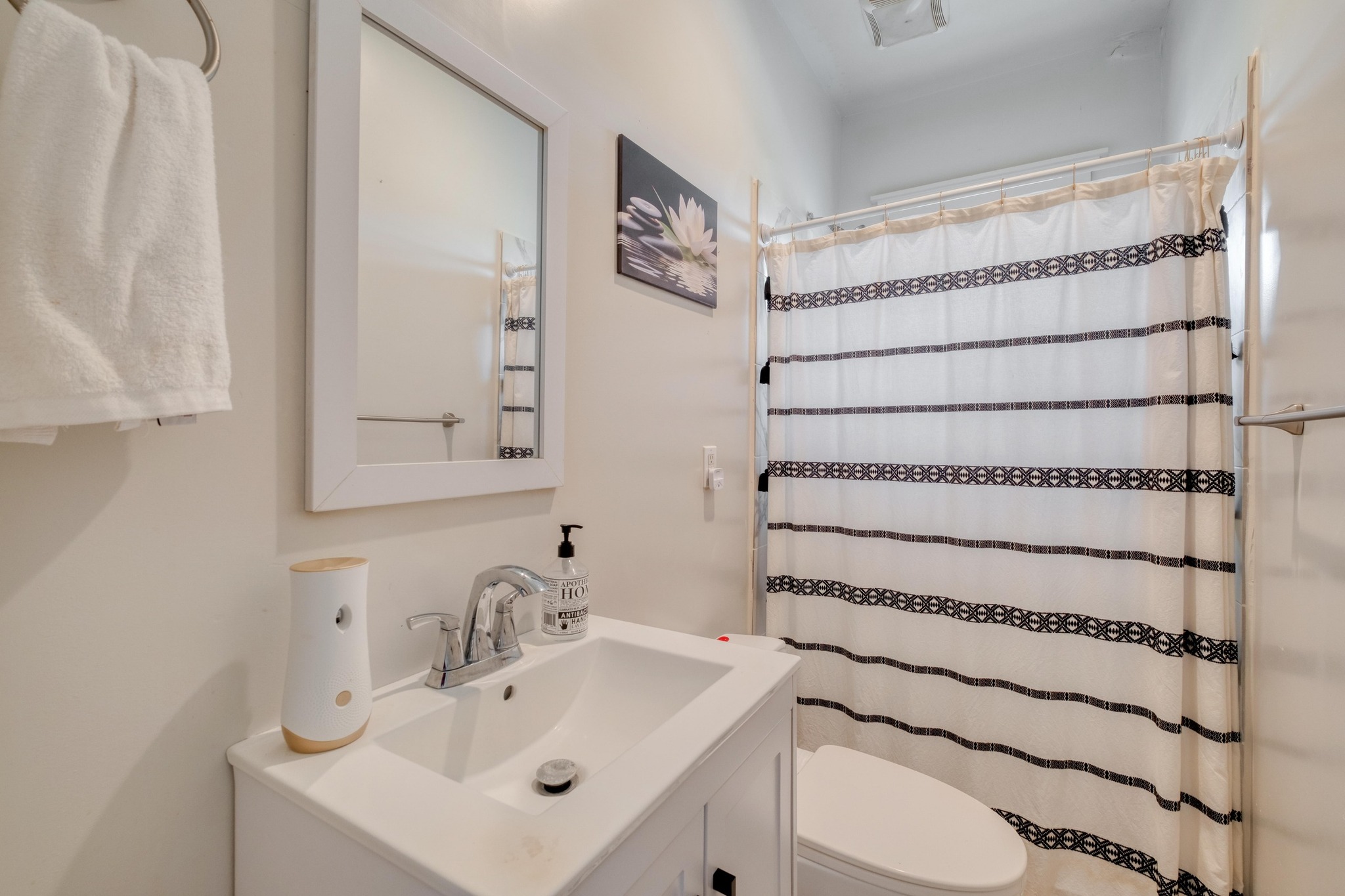 1601 County Road 466 Elgin, TX 78621 - Photo 24 of 39 a bathroom with a sink and a mirror