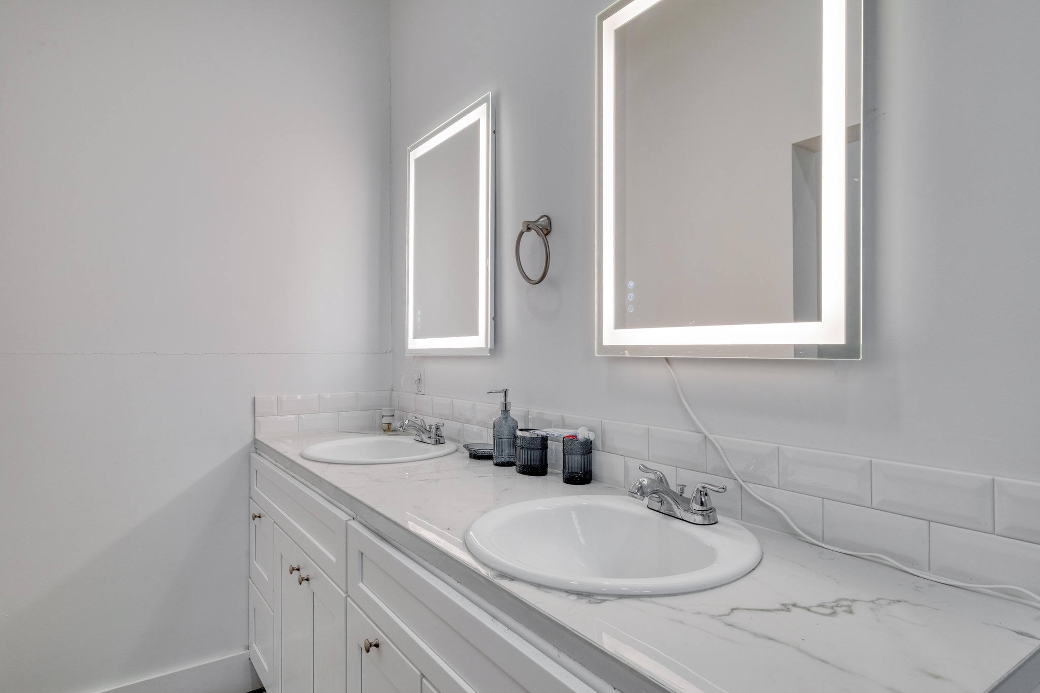 1601 County Road 466 Elgin, TX 78621 - Photo 33 of 39 a bathroom with a double vanity sink mirror and