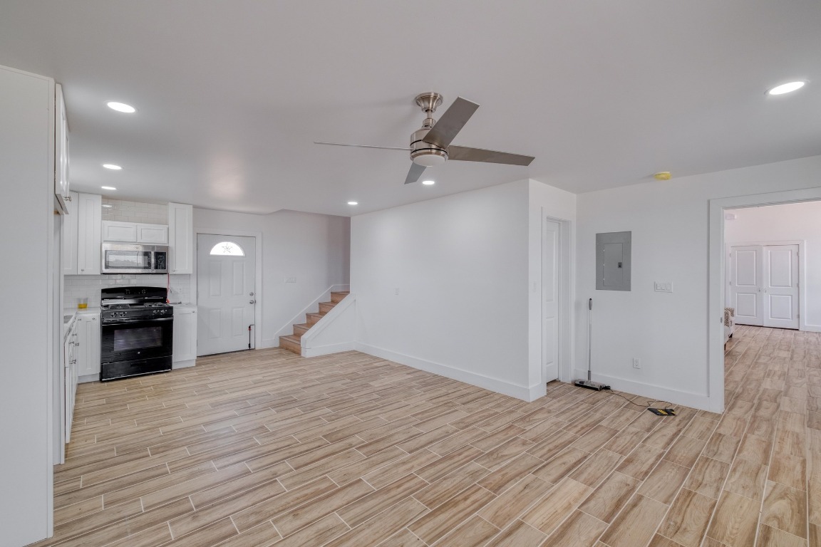 1601 County Road 466 Elgin, TX 78621 - Photo 34 of 39 a view of a kitchen with a sink and a stove top oven