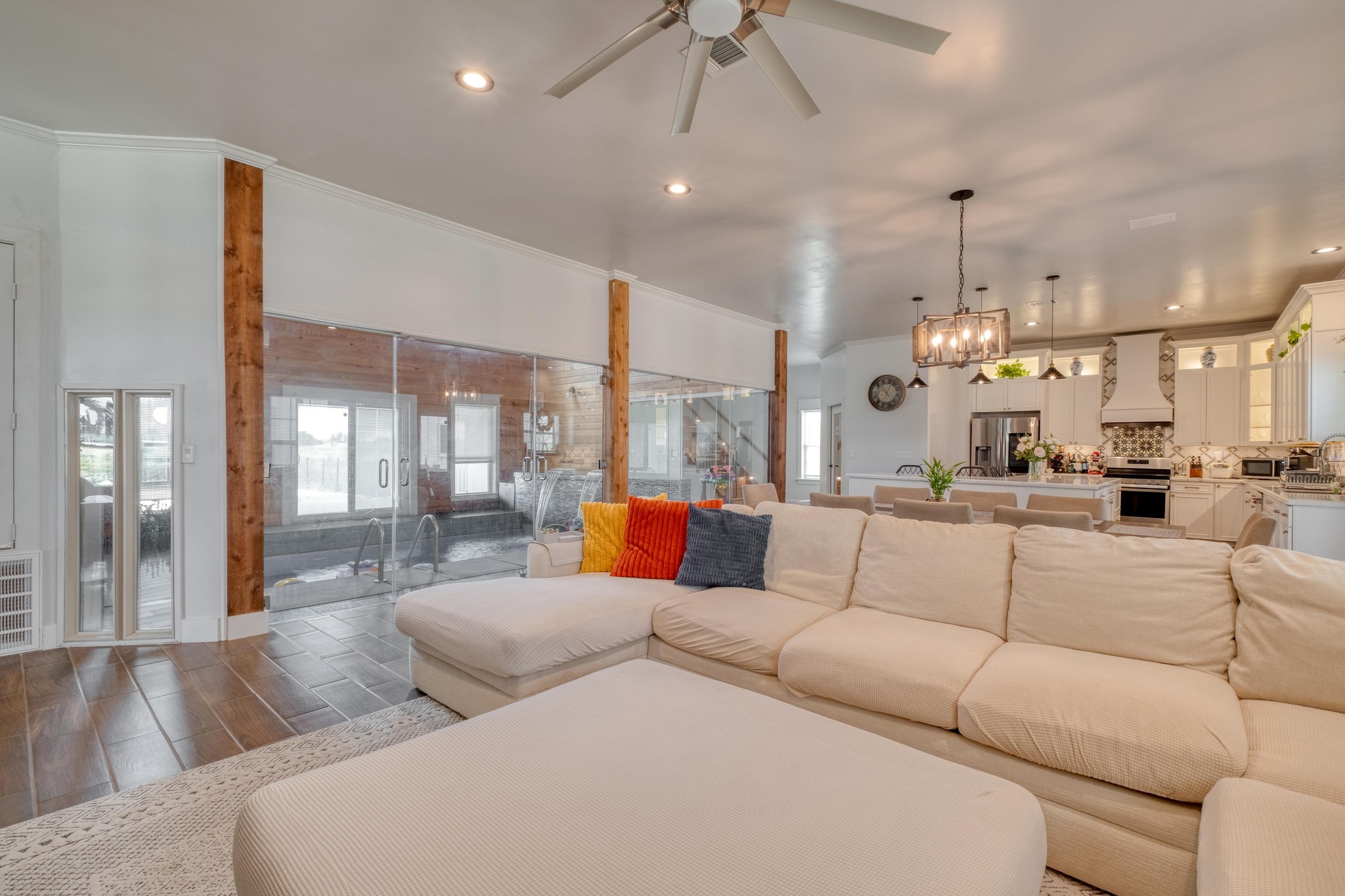 1601 County Road 466 Elgin, TX 78621 - Photo 10 of 39 a living room with furniture and a chandelier