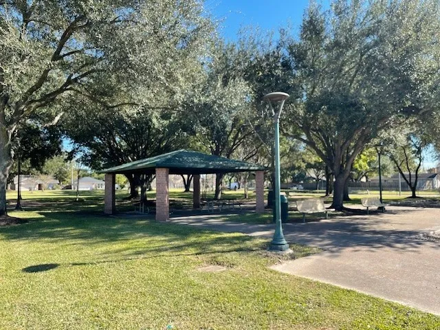 a front view of a house with a yard table and chairs