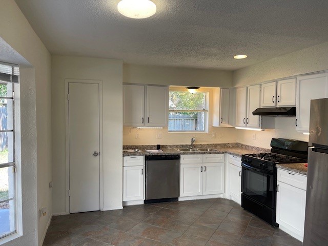6823 Zapata Drive Houston, TX 77083 - Photo 7 of 21 Experience the joy of cooking in this fully equipped kitchen...refrigerator included!