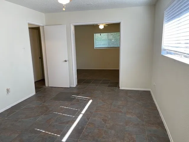 an empty room with windows