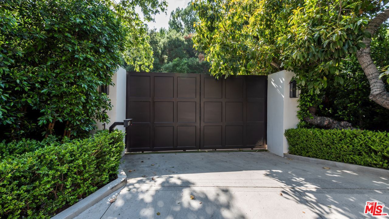 2231 Benedict Canyon Drive Beverly Hills, CA 90210 - Photo 2 of 50 a view of backyard and trees