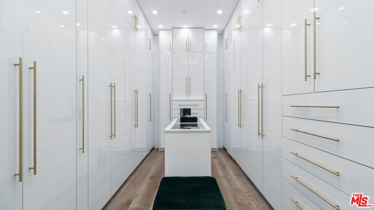 2231 Benedict Canyon Drive Beverly Hills, CA 90210 - Photo 28 of 50 a bathroom with a sink and a shower