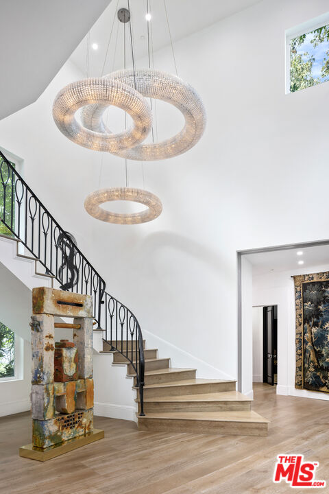 2231 Benedict Canyon Drive Beverly Hills, CA 90210 - Photo 46 of 50 a view of entryway and hall with wooden floor