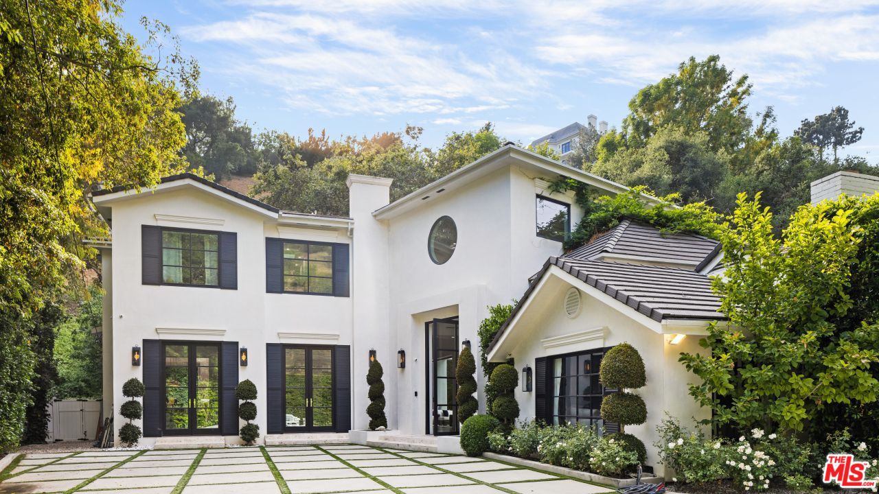 2231 Benedict Canyon Drive Beverly Hills, CA 90210 - Photo 7 of 50 a house view with a outdoor space