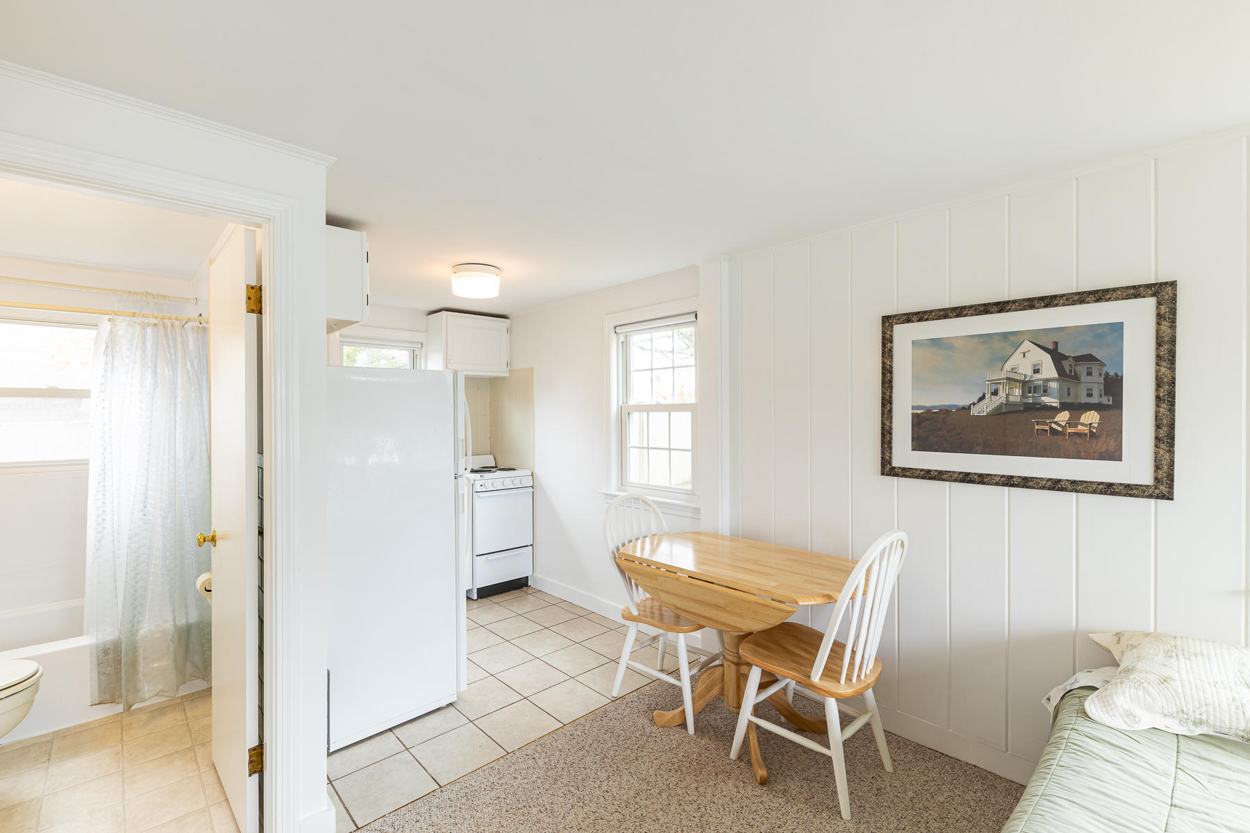 49 Lower County Road Dennis, MA 02639 - Photo 12 of 19 a view of a dining room with furniture and window