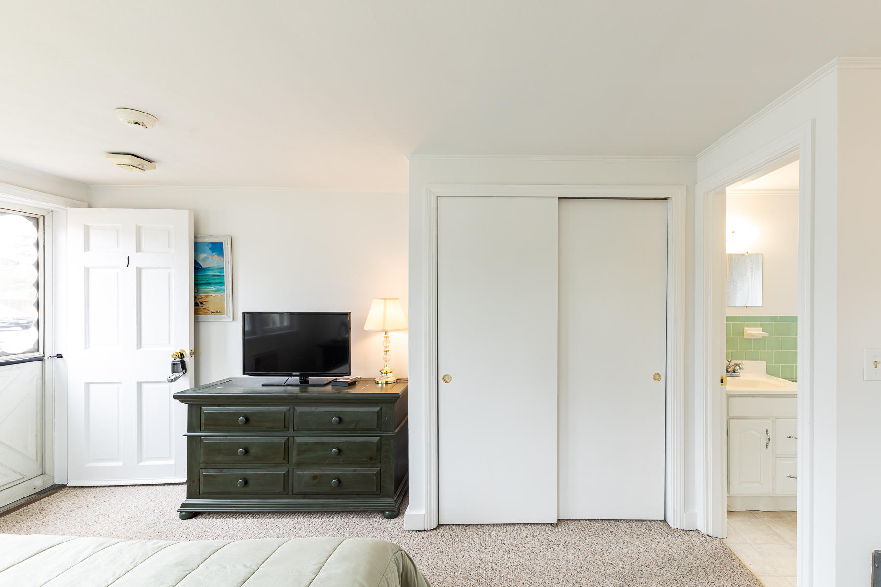 49 Lower County Road Dennis, MA 02639 - Photo 9 of 19 a view of room with flat screen tv and cabinets