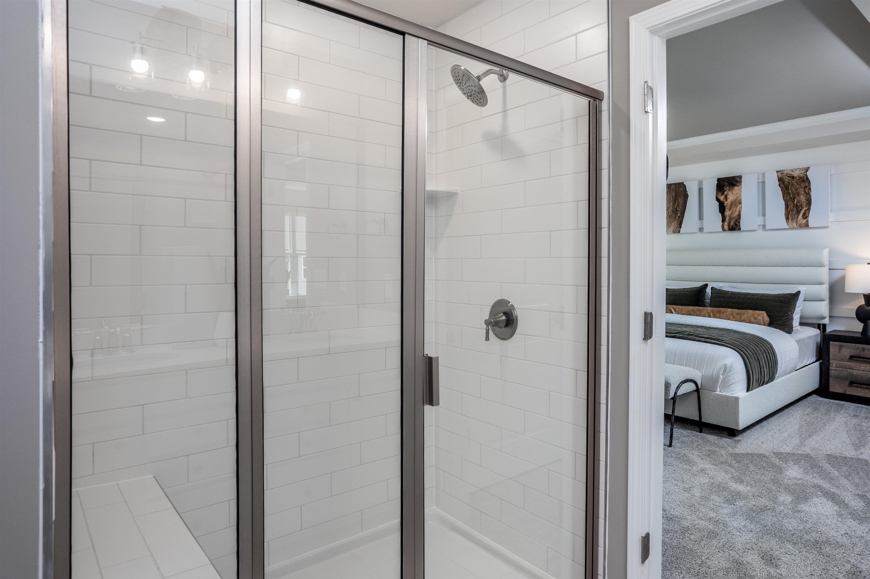 320 Abbots Ml Drive Raleigh, NC 27603 - Photo 15 of 17 a bathroom with a white tub shower and a mirror