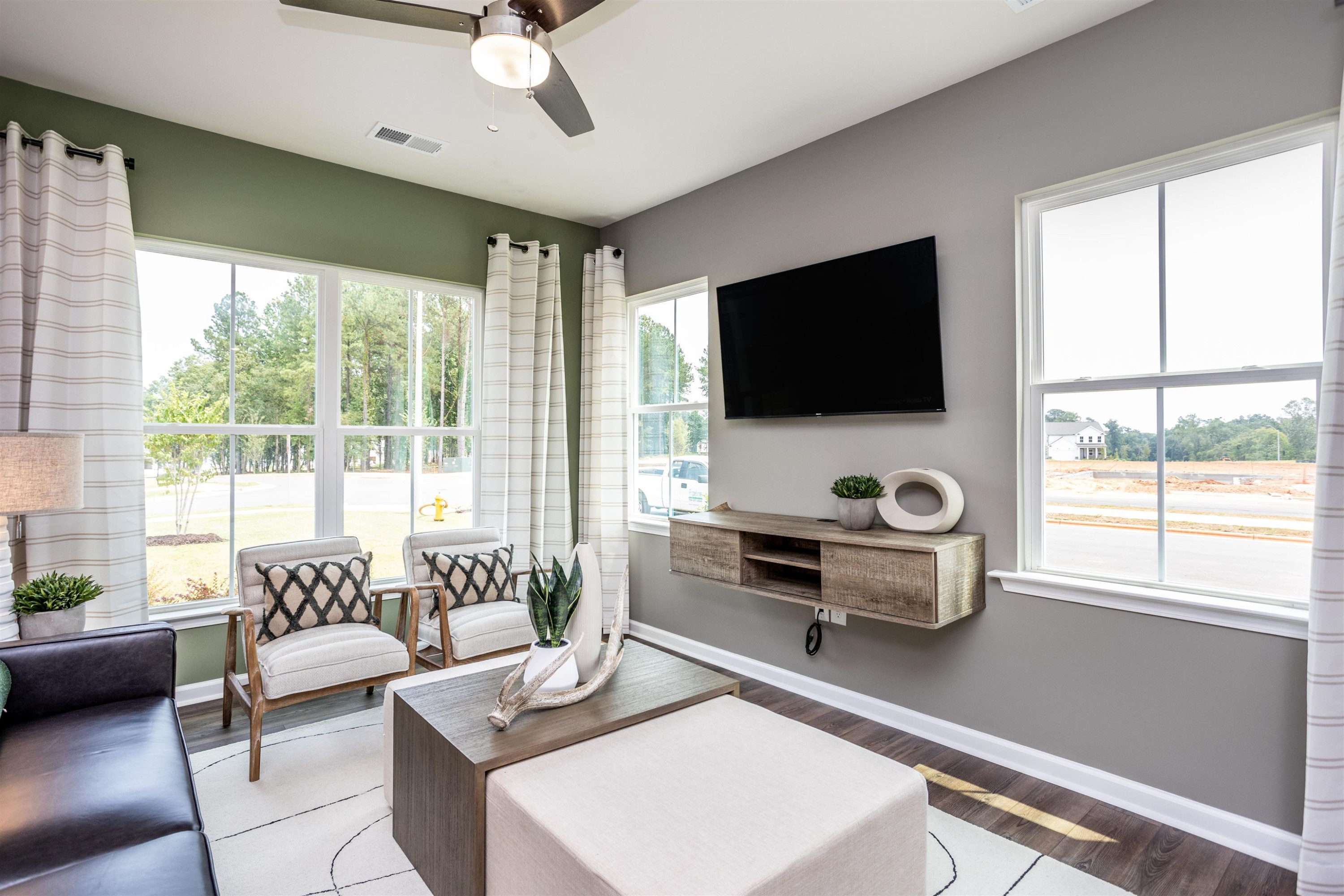 320 Abbots Ml Drive Raleigh, NC 27603 - Photo 2 of 17 a living room with furniture and a flat screen tv