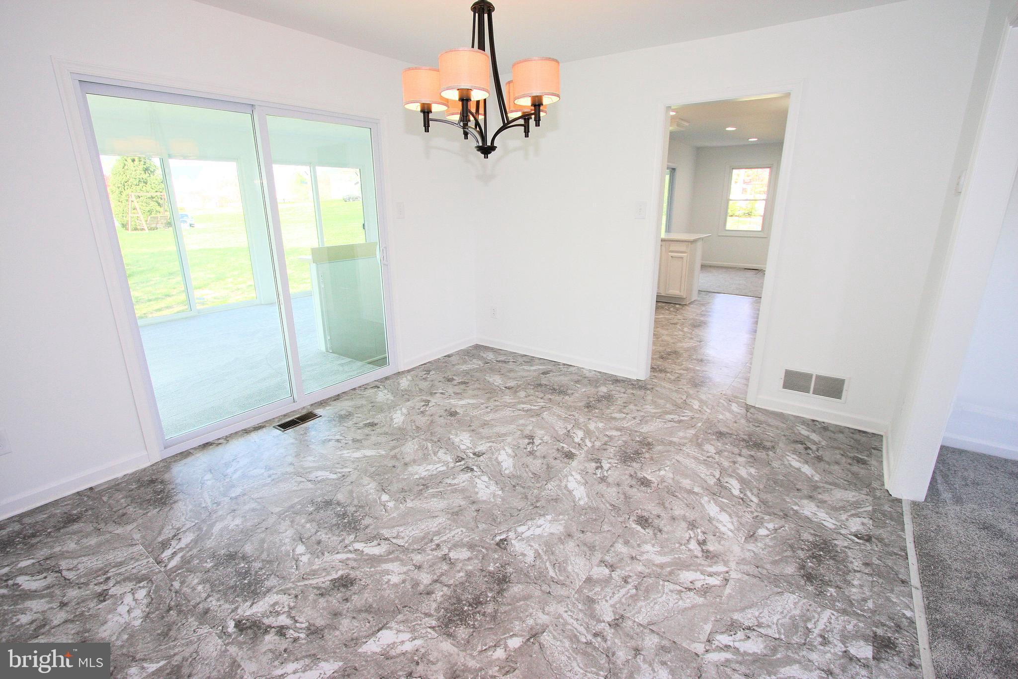3250 Sharp Road Glenwood, MD 21738 - Photo 18 of 44 Dining room with access to sunroom