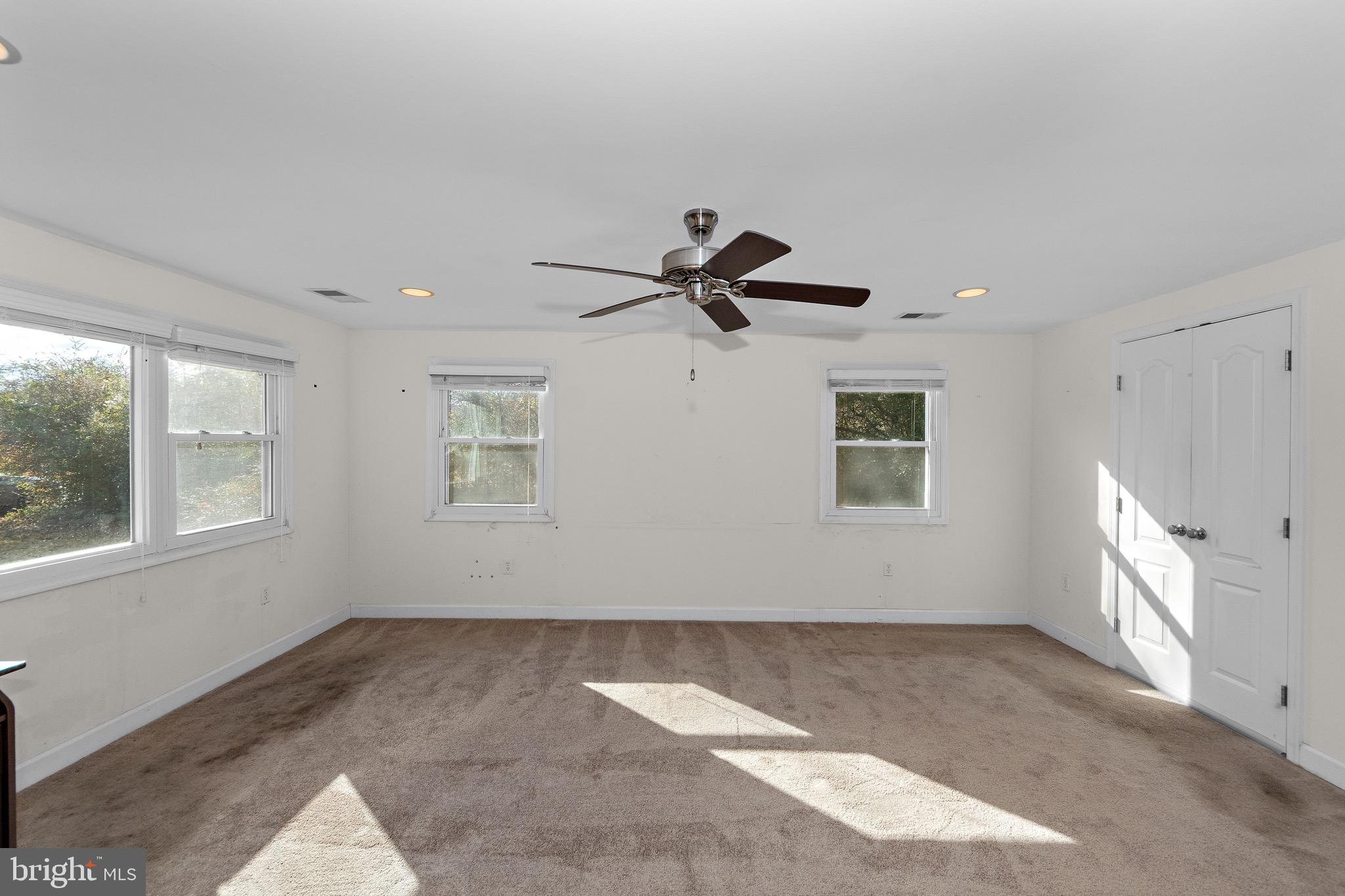 115 Valley View Avenue Edgewater, MD 21037 - Photo 14 of 56 wooden floor in an empty room with a window