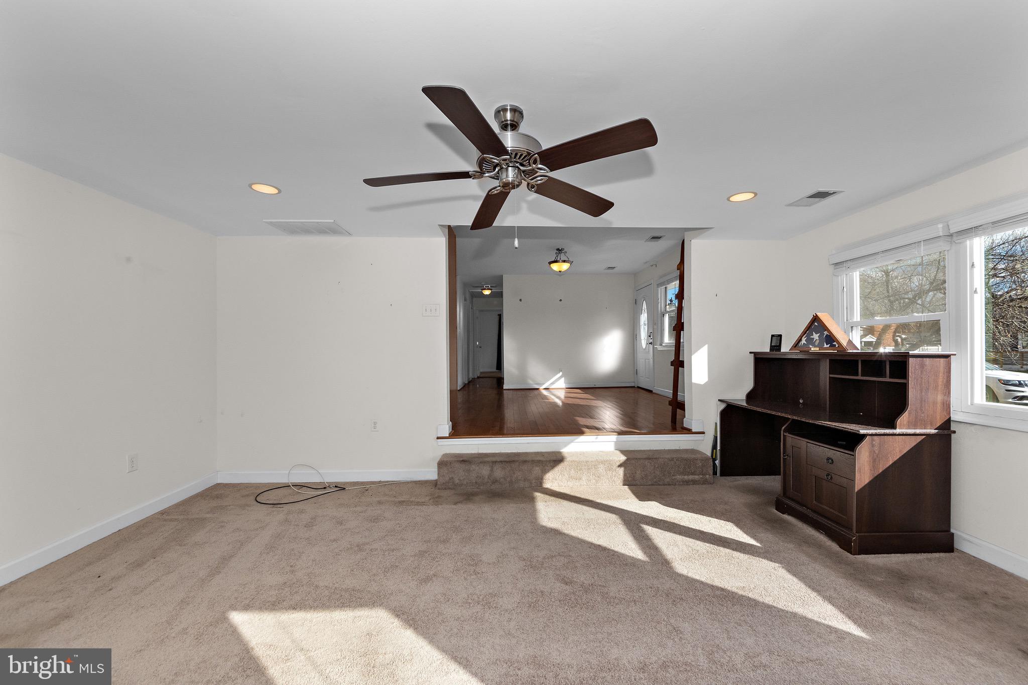 115 Valley View Avenue Edgewater, MD 21037 - Photo 17 of 56 a living room with furniture and a ceiling fan