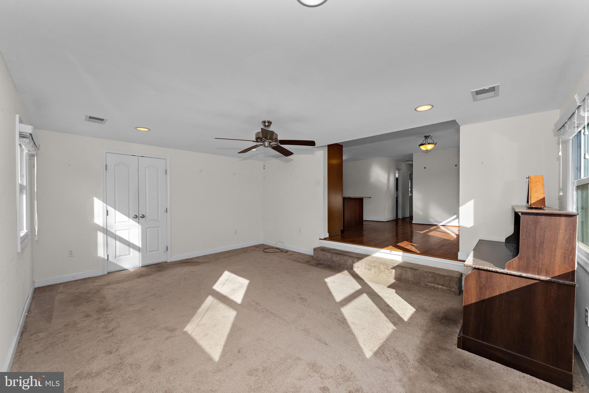 115 Valley View Avenue Edgewater, MD 21037 - Photo 18 of 56 a living room with furniture and a chandelier
