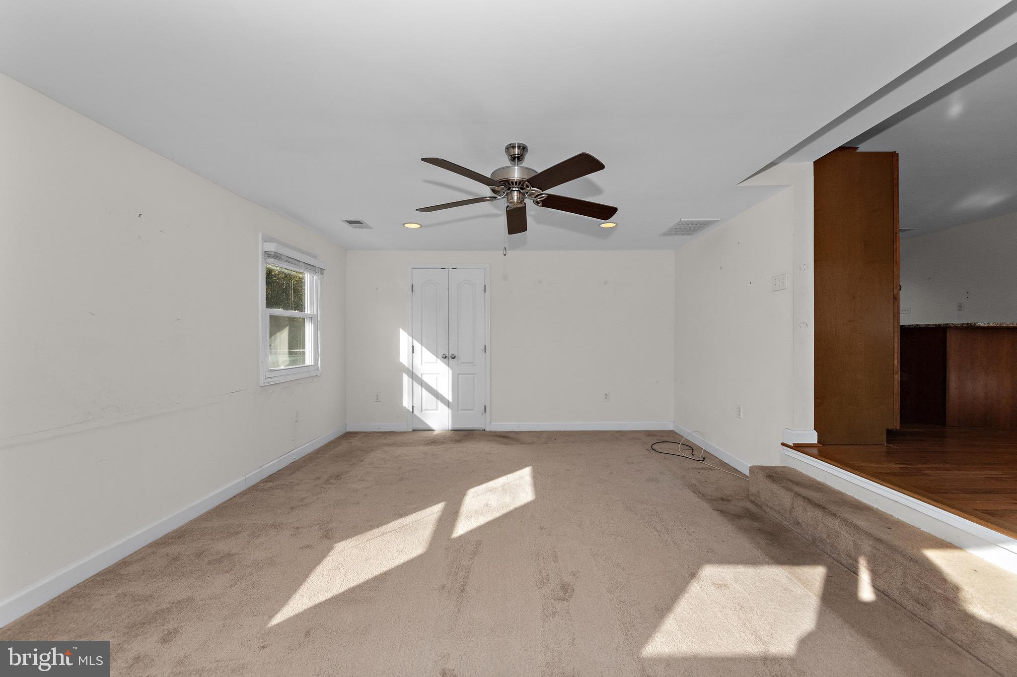 115 Valley View Avenue Edgewater, MD 21037 - Photo 19 of 56 a view of a livingroom with a ceiling fan