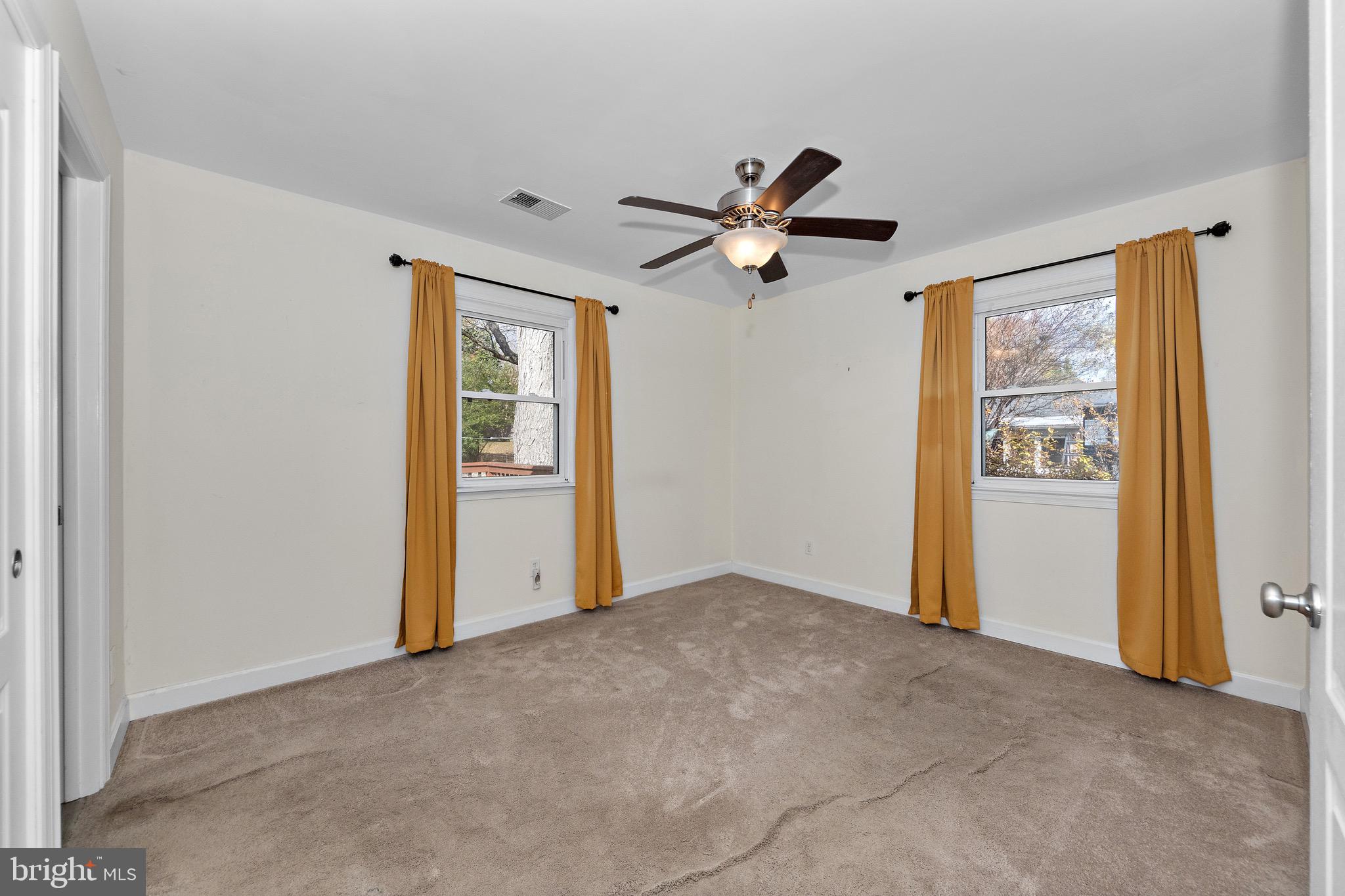 115 Valley View Avenue Edgewater, MD 21037 - Photo 22 of 56 a view of an empty room with a window