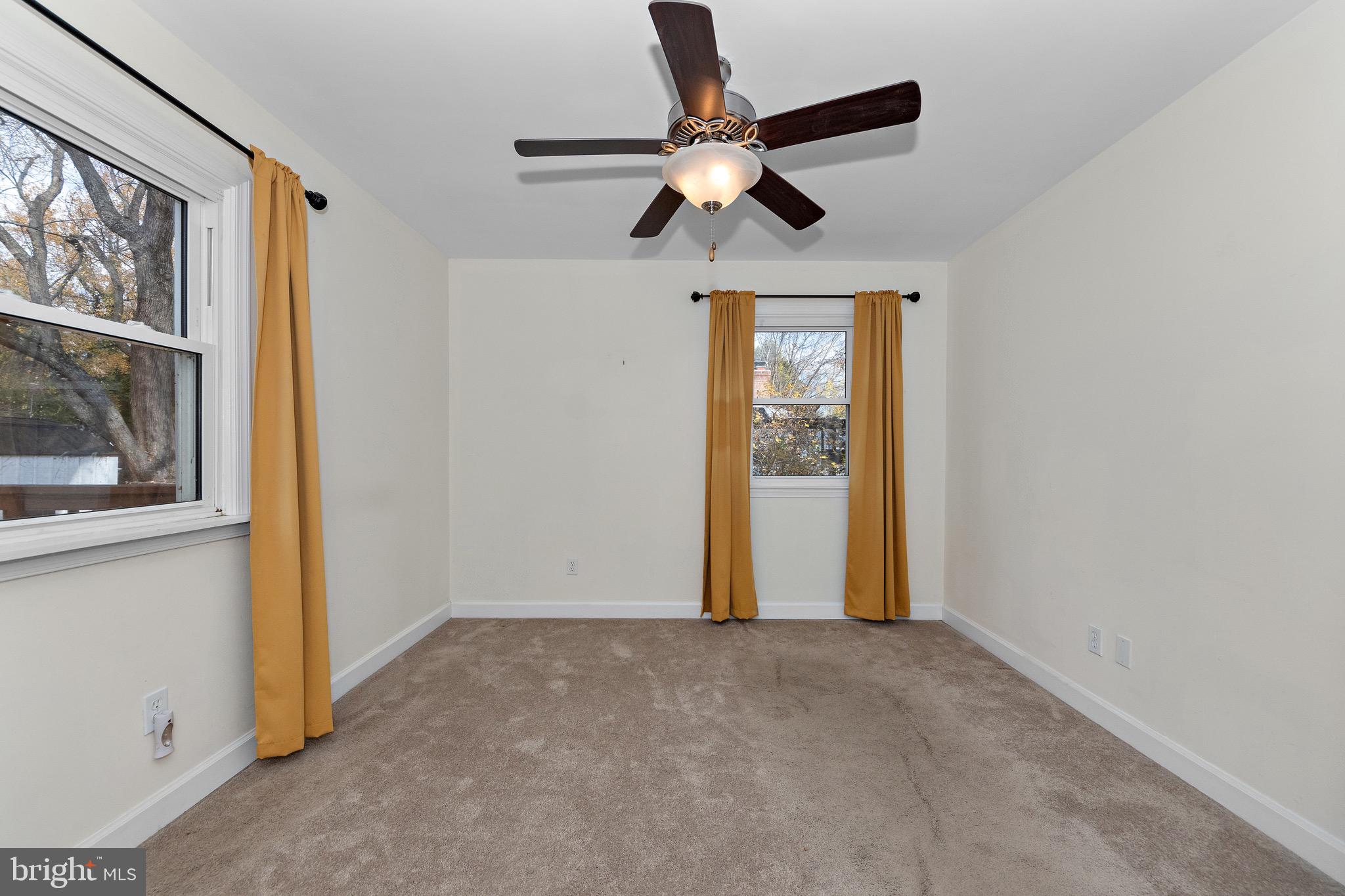 115 Valley View Avenue Edgewater, MD 21037 - Photo 25 of 56 a view of room with window and ceiling fan
