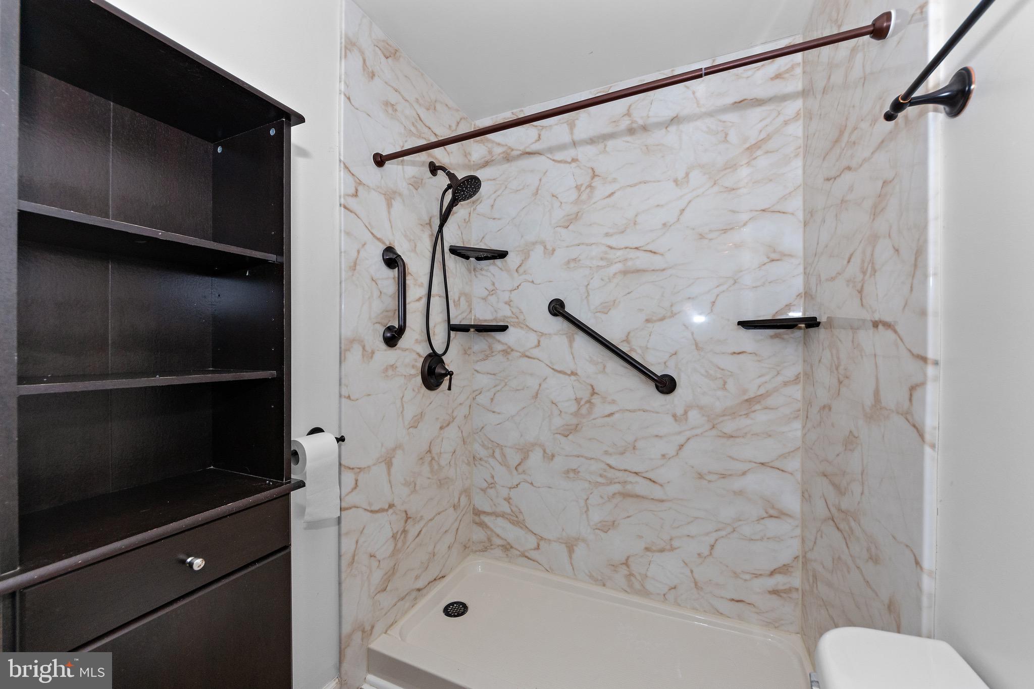 115 Valley View Avenue Edgewater, MD 21037 - Photo 27 of 56 a bathroom with a shower and a toilet