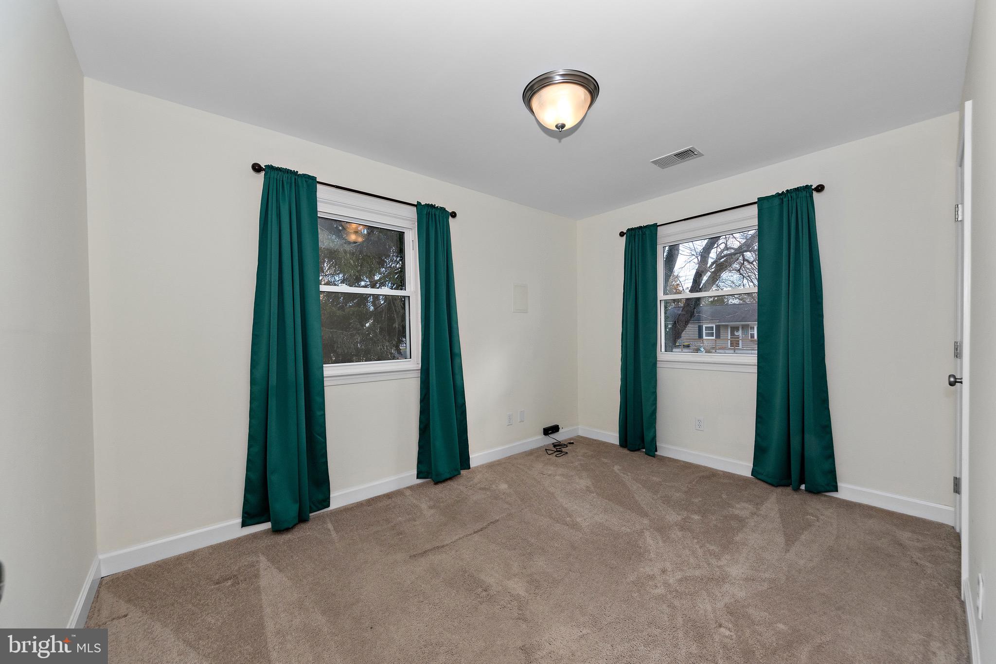 115 Valley View Avenue Edgewater, MD 21037 - Photo 29 of 56 a view of an empty room with window and closet area