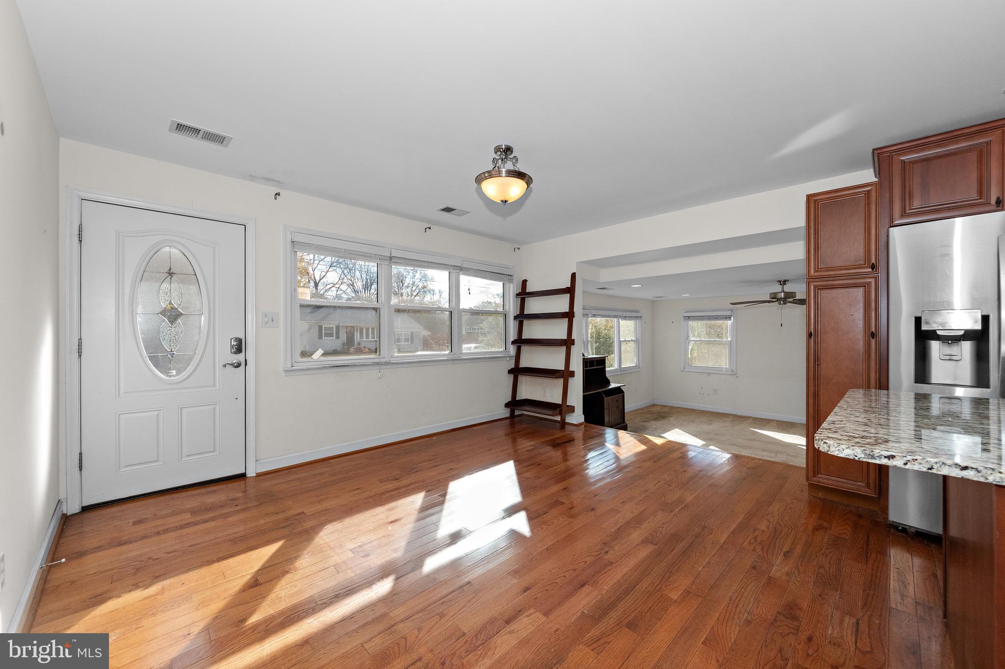 115 Valley View Avenue Edgewater, MD 21037 - Photo 5 of 56 a view of empty room with wooden floor and fan