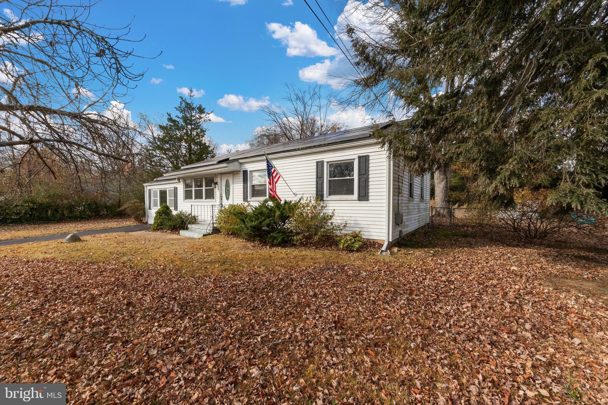 115 Valley View Avenue Edgewater, MD 21037 - Photo 51 of 56 a front view of house with yard and trees around