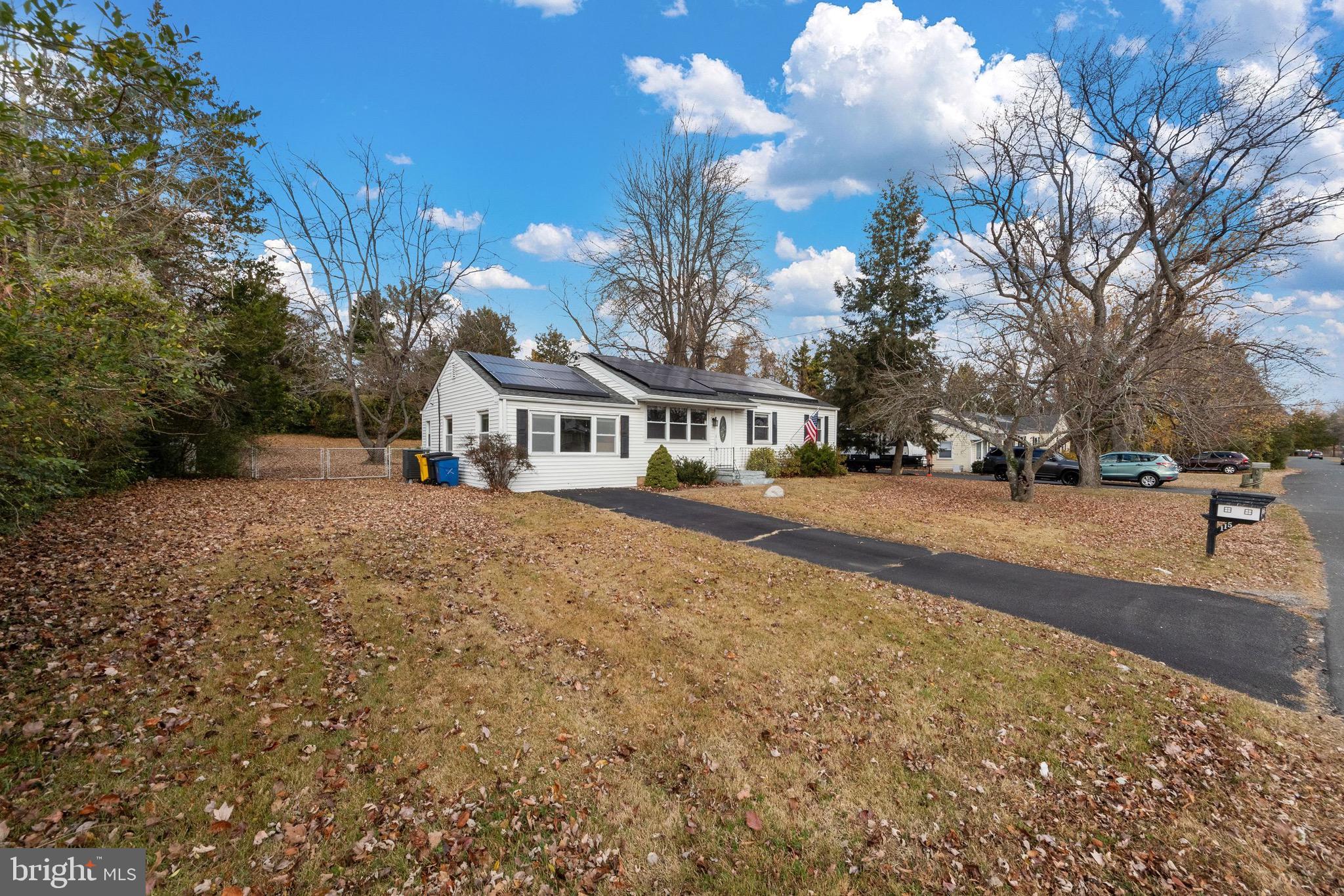 115 Valley View Avenue Edgewater, MD 21037 - Photo 52 of 56 a front view of a building with street view and trees