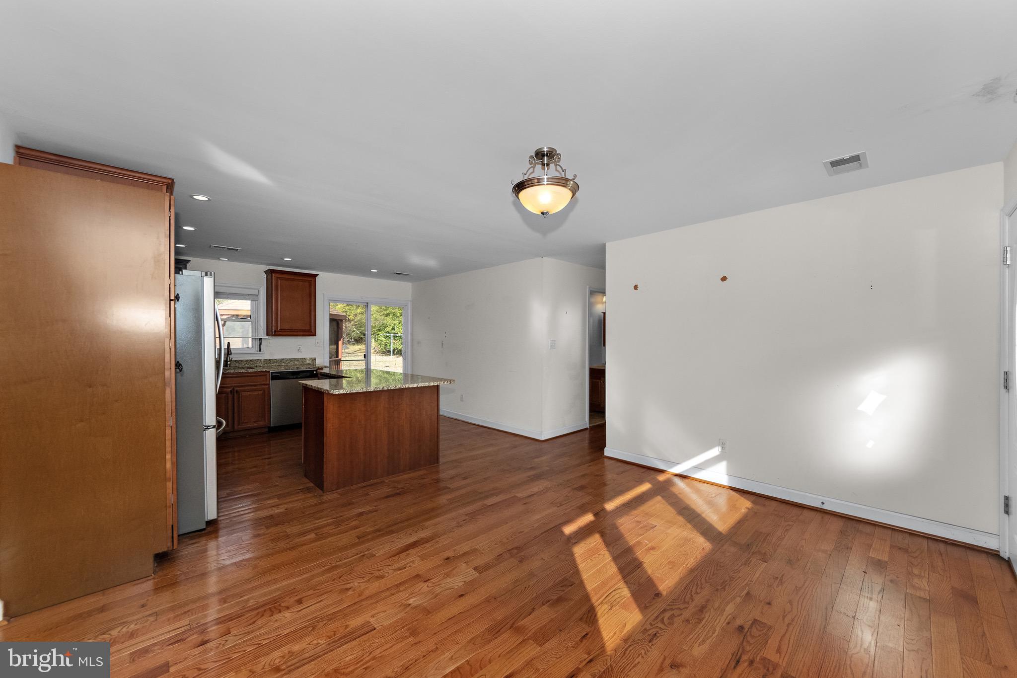 115 Valley View Avenue Edgewater, MD 21037 - Photo 8 of 56 a view of kitchen and wooden floor