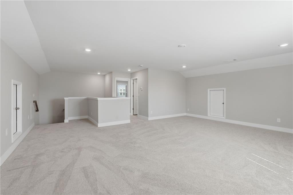 1413 Bluffs Ridge Way Canton, GA 30114 - Photo 31 of 62 a view of an empty room with a window