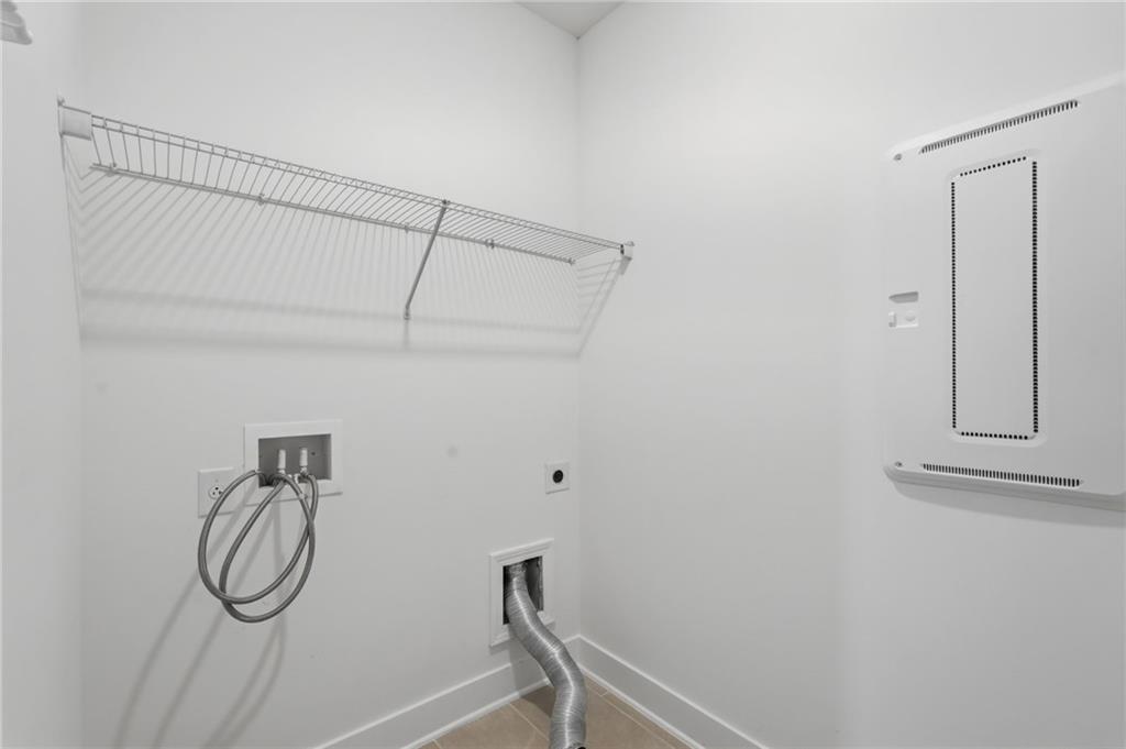 1413 Bluffs Ridge Way Canton, GA 30114 - Photo 36 of 62 a bathroom with a shower