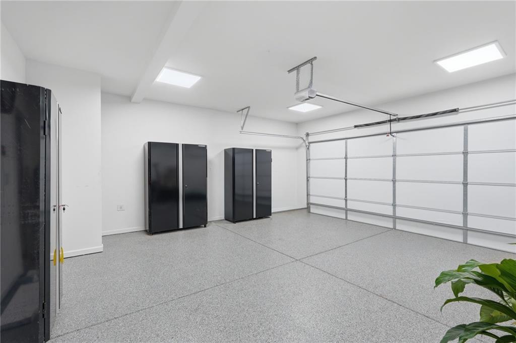 1413 Bluffs Ridge Way Canton, GA 30114 - Photo 37 of 62 a view of a garage