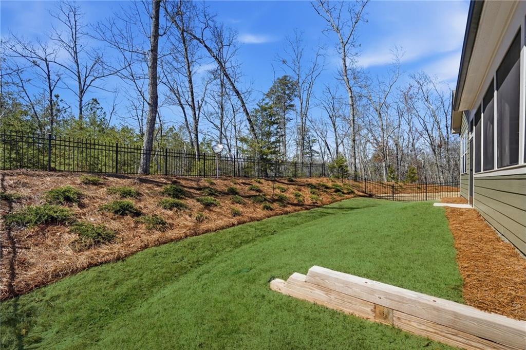 1413 Bluffs Ridge Way Canton, GA 30114 - Photo 39 of 62 a view of a park with large trees