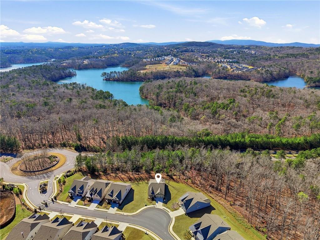 1413 Bluffs Ridge Way Canton, GA 30114 - Photo 42 of 62 a view of a balcony with mountain view and wooden floor