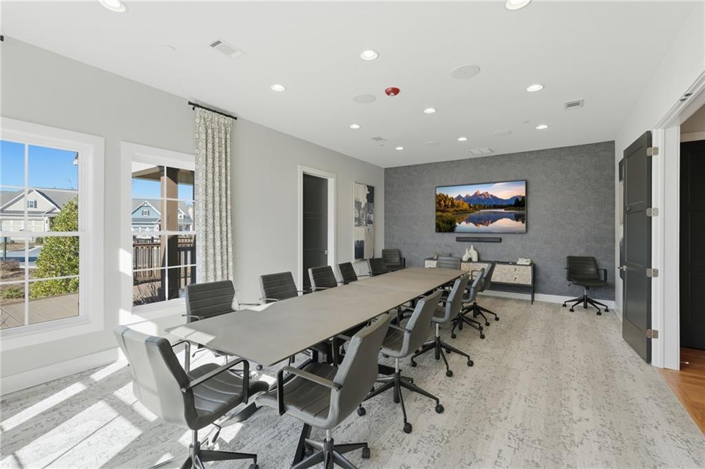 1413 Bluffs Ridge Way Canton, GA 30114 - Photo 48 of 62 a view of a dining room with furniture